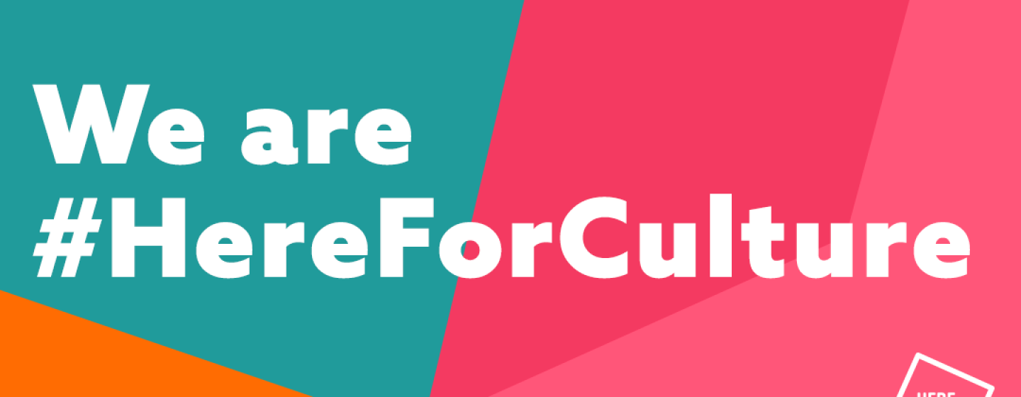 Text saying We are Here for Culture over an abstract pink, green and orange background