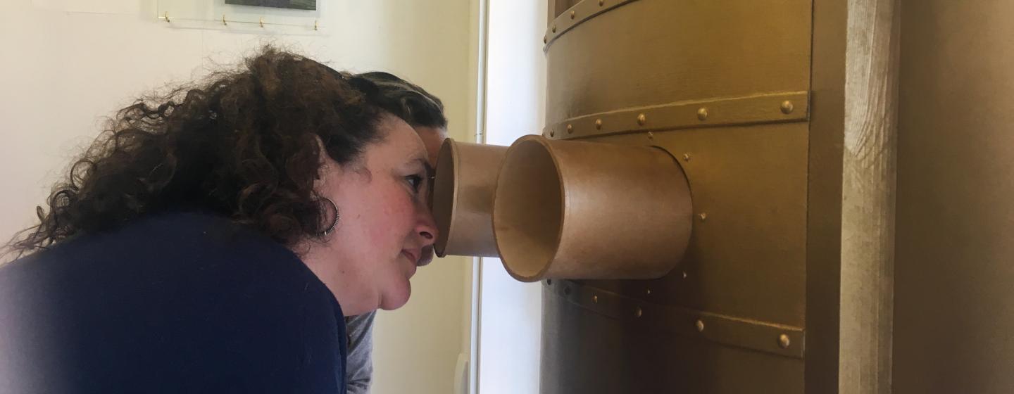 Woman looking into a box