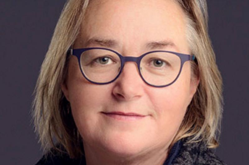 A photo of a woman wearing glasses 