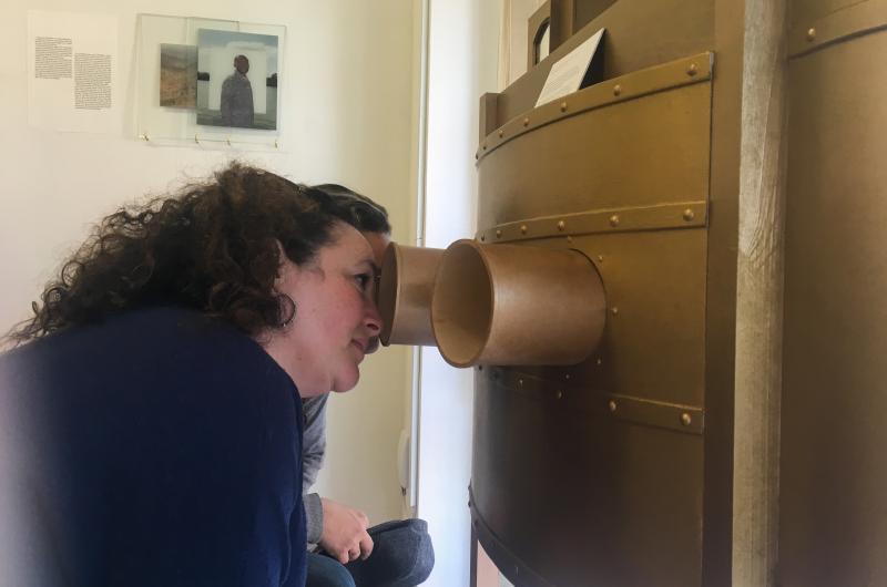 Woman looking into a box