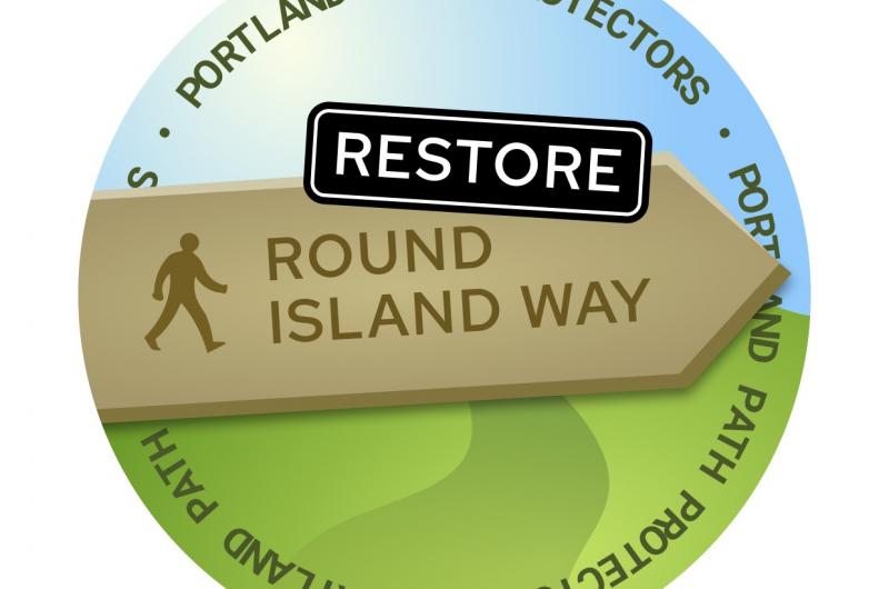 A sign saying Restore Round Island Way
