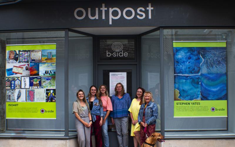 Group of people outside Outpost